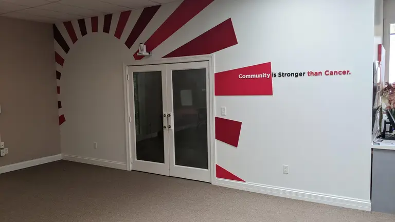 Wall graphics in hallway — Interior or ADA signage
