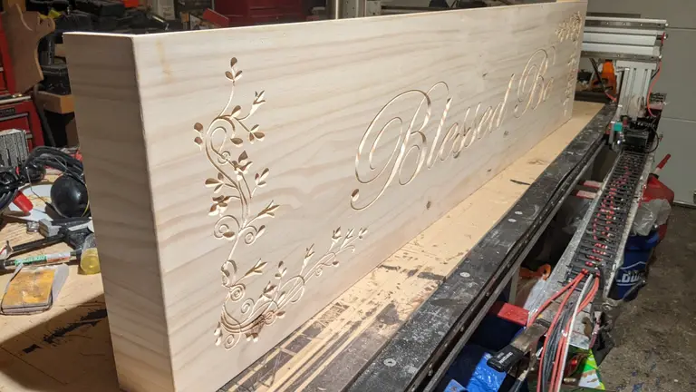 Carved wood sign — CNC or fabricated sign