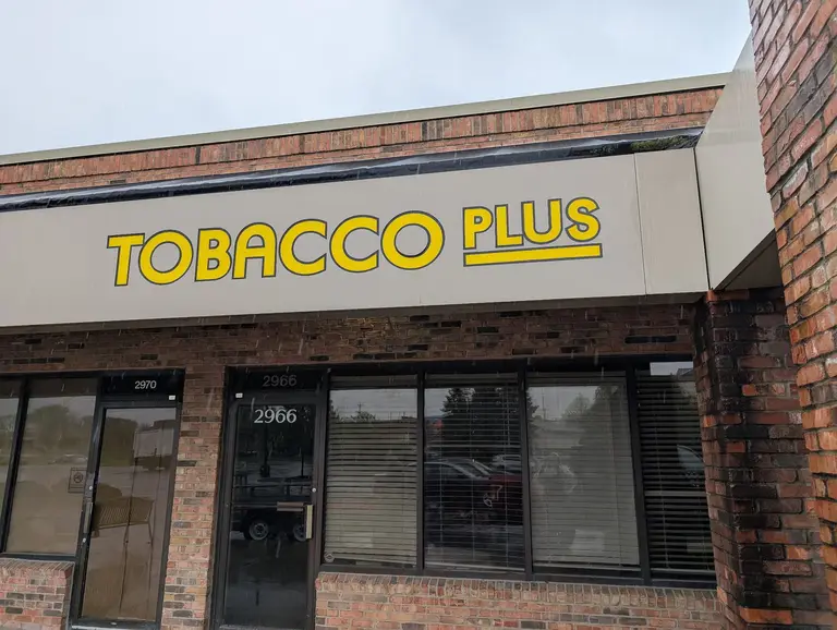 Fascia letters on brick storefront — Channel letters